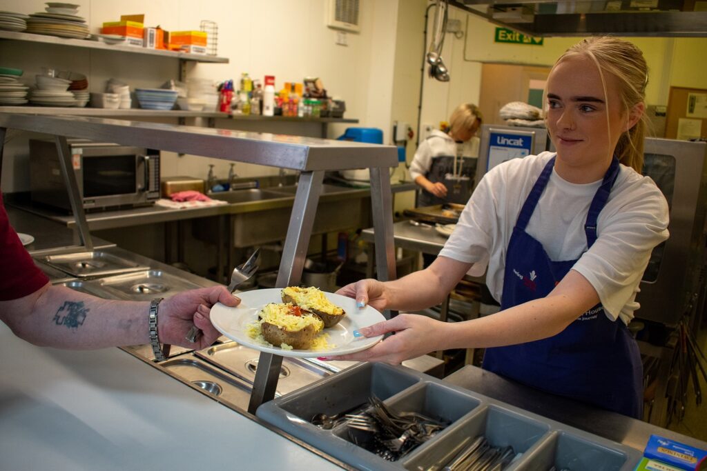Hot food served to people who are homeless at Emmanuel House in Nottingham