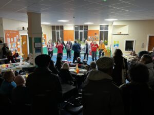 Grassroots Vocal Choir performing at Light Night 2023 at Emmanuel House Support Centre