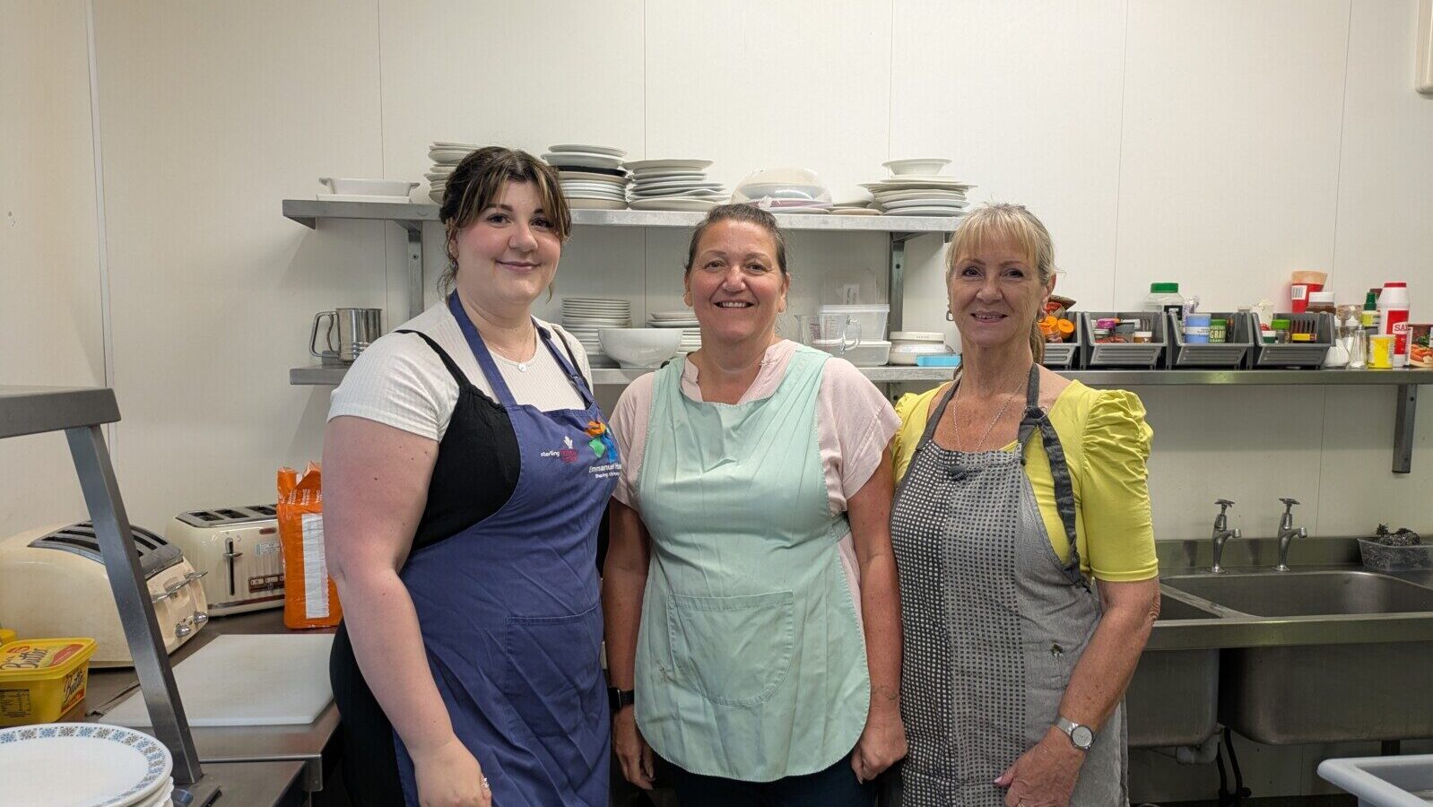 Kuehne and Nagel colleagues volunteering in the kitchen at Emmanuel House